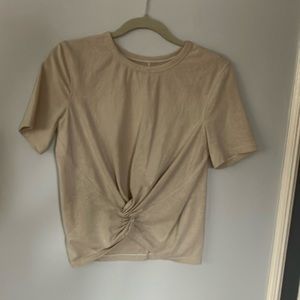 Lululemon beige top with gold shimmer. Size small.